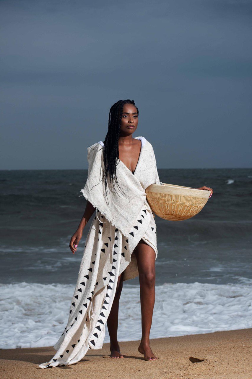 Bogolan wrap dress detail — handcrafted drape — SAAHEL