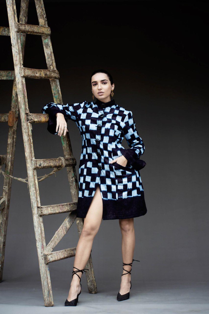 Indigo coat detail — bold statement sleeves — artisan fashion — SAAHEL