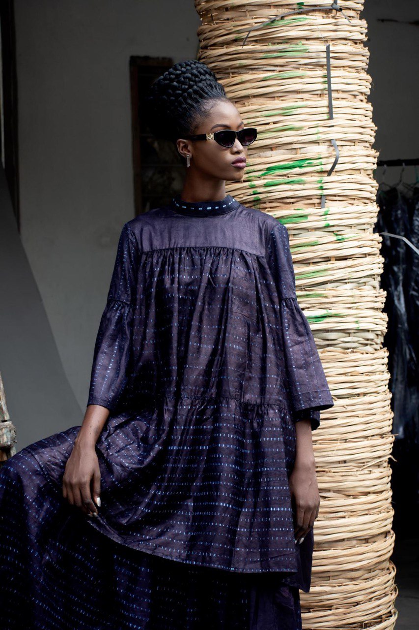 Indigo layered dress detail — fluid silhouette — artisan womenswear — SAAHEL