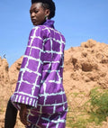 Purple Woodin coat with bold graphic patterns and structured silhouette — SAAHEL