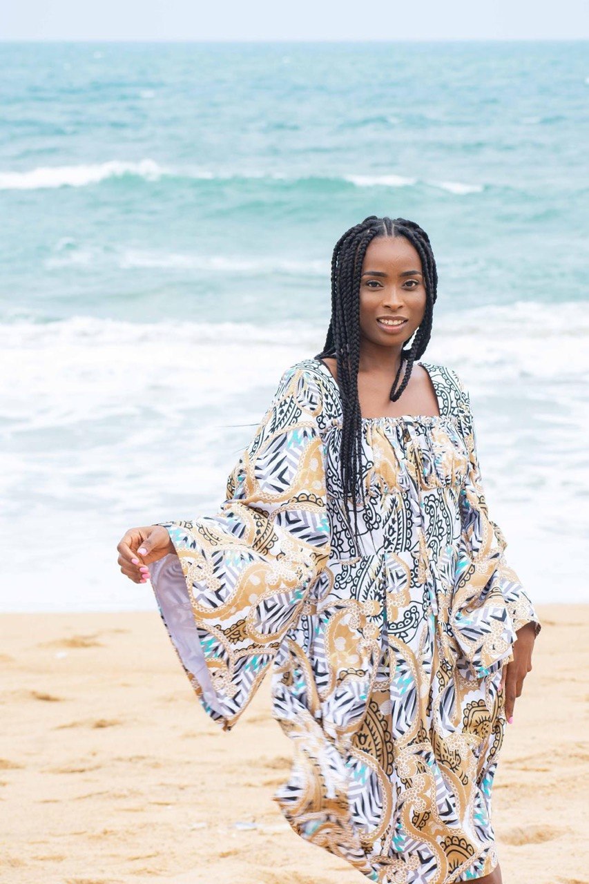Feminine Woodin mini dress back view — artisan fashion — SAAHEL